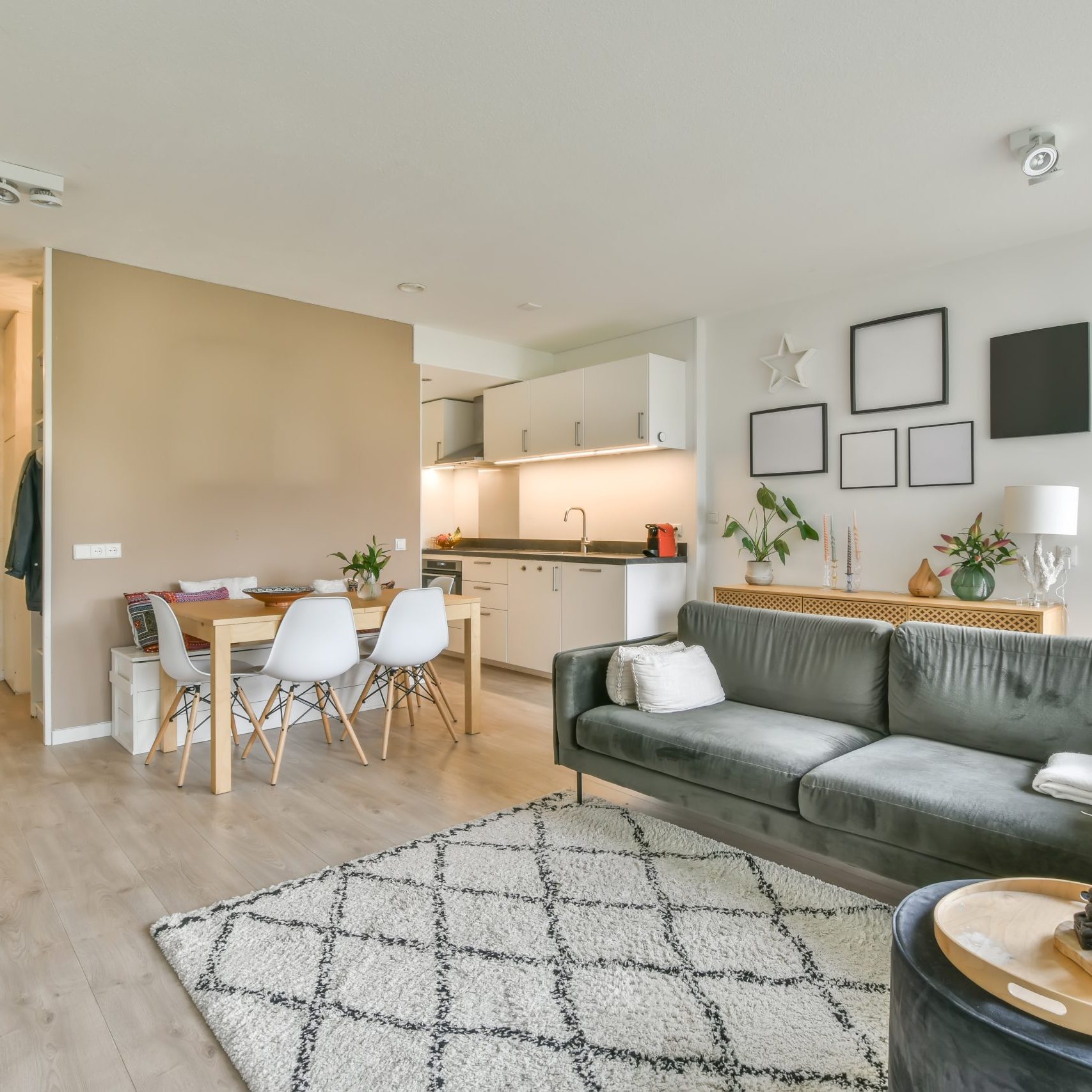 Stylish and cozy living room with soft decorative huge sofa